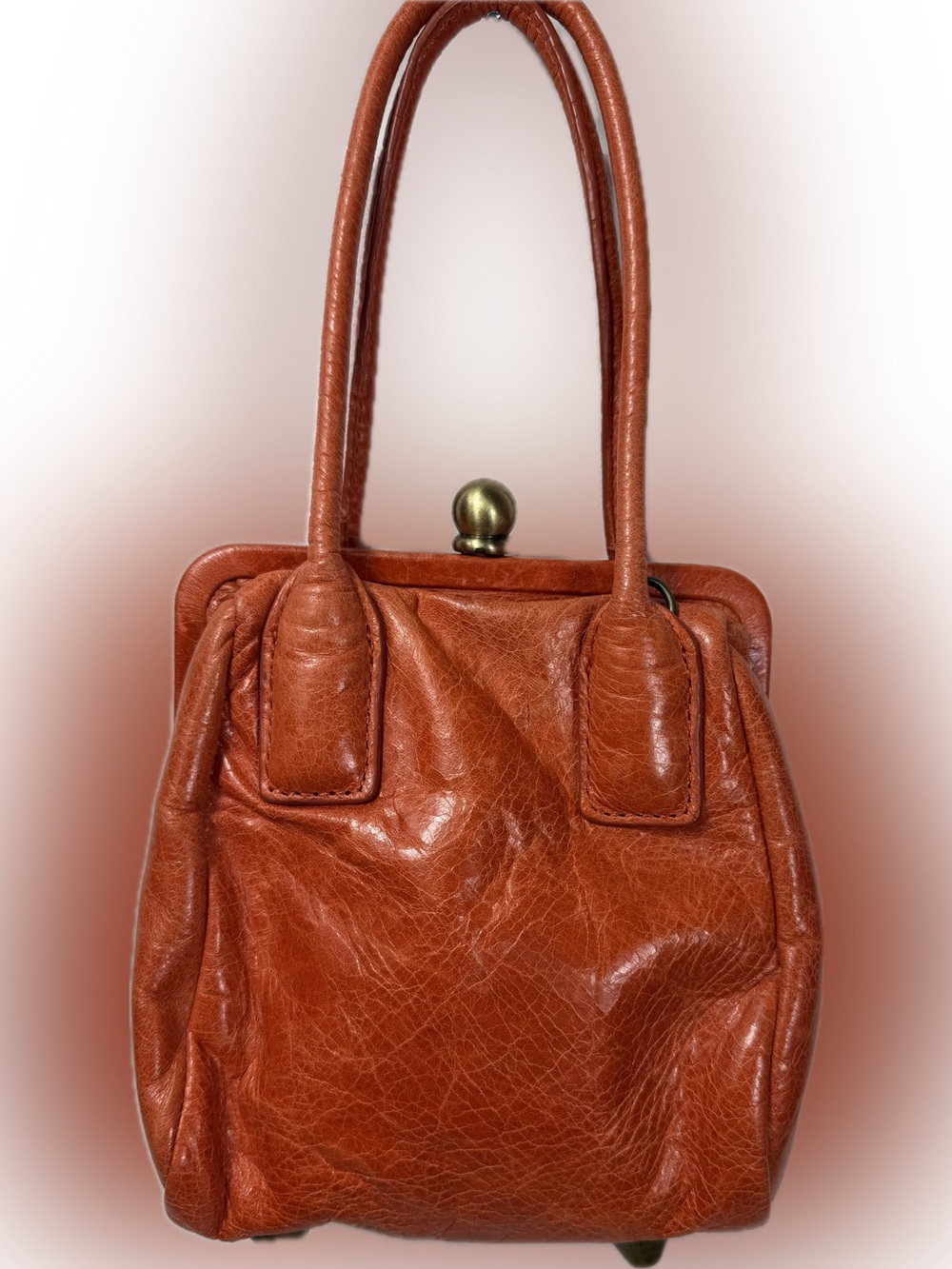 Hobo International orange leather mini handbag